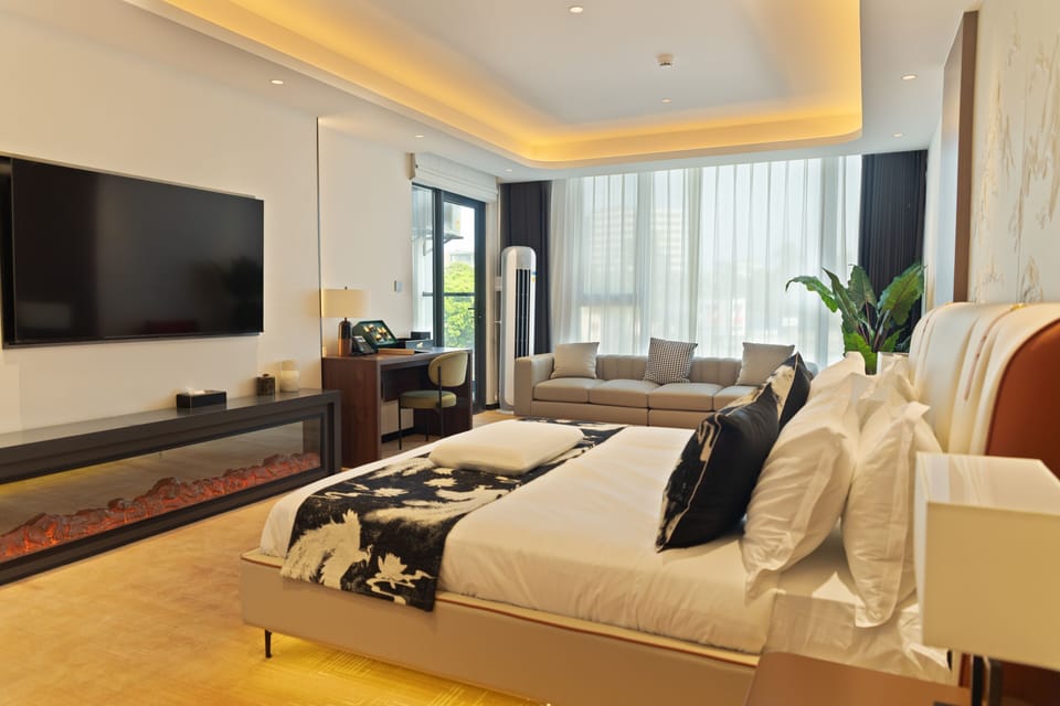 Junior Suite, Balcony, Courtyard View | In-room safe, desk, laptop workspace, soundproofing