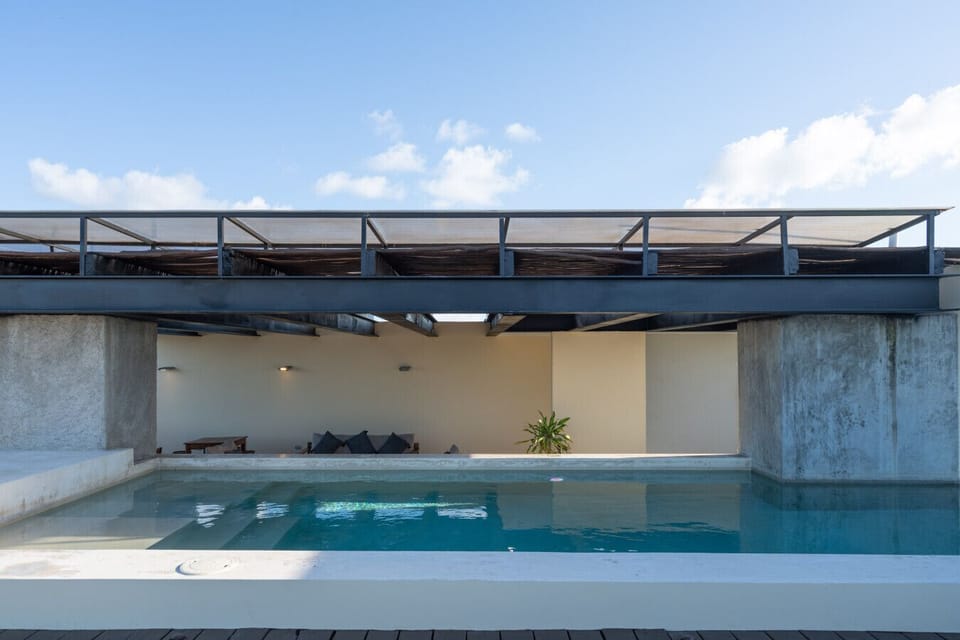 Rooftop pool with fresh vibes, perfect for sunbathing and cooling off.