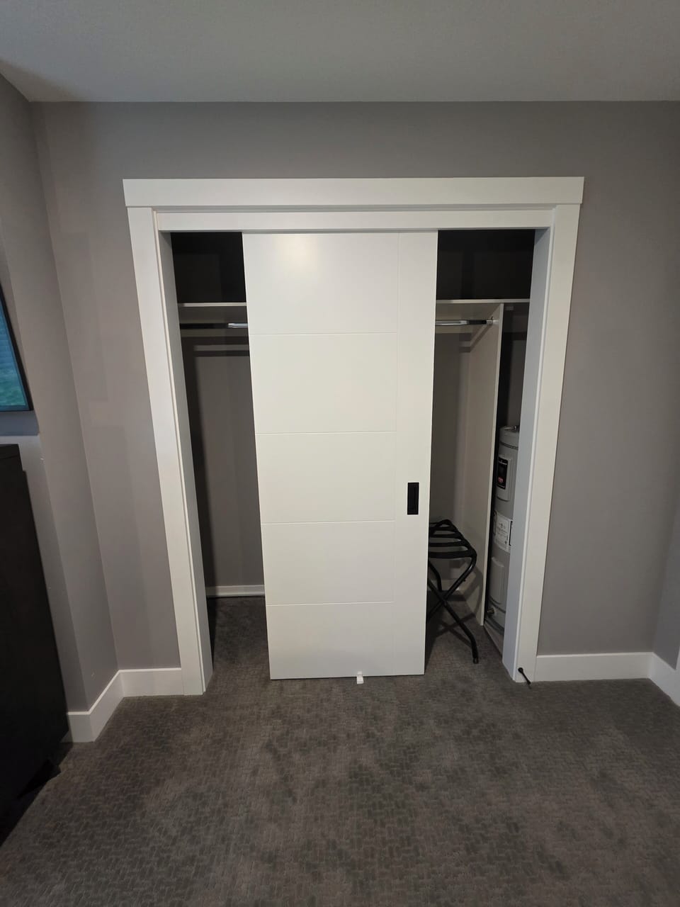 Closet space and luggage rack.