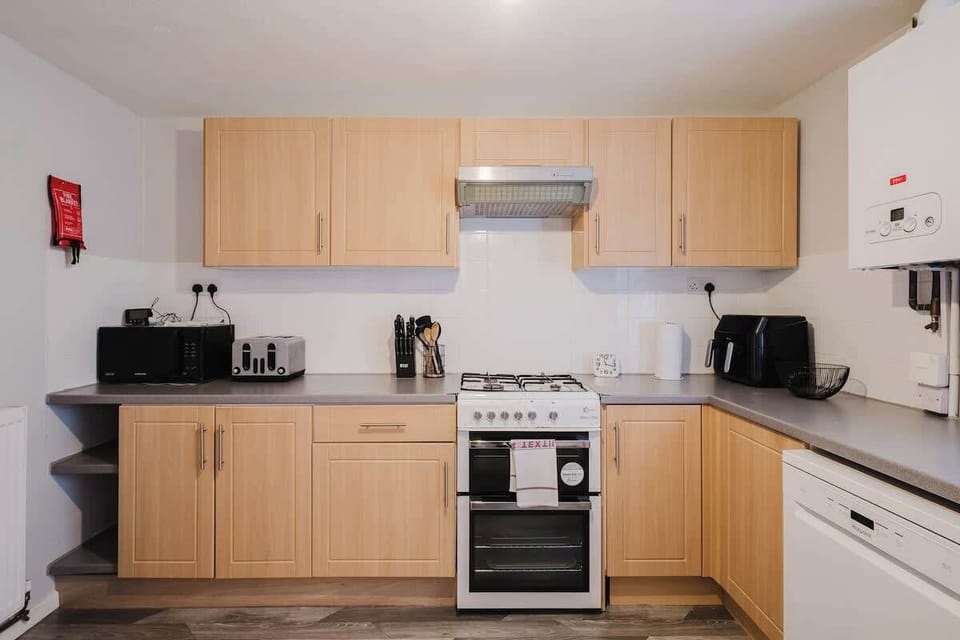 A modern, well-equipped kitchen with everything you need to prepare meals during your stay.