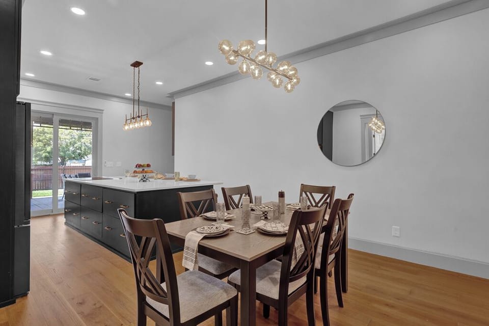 Dining table with seating for six and large kitchen bar