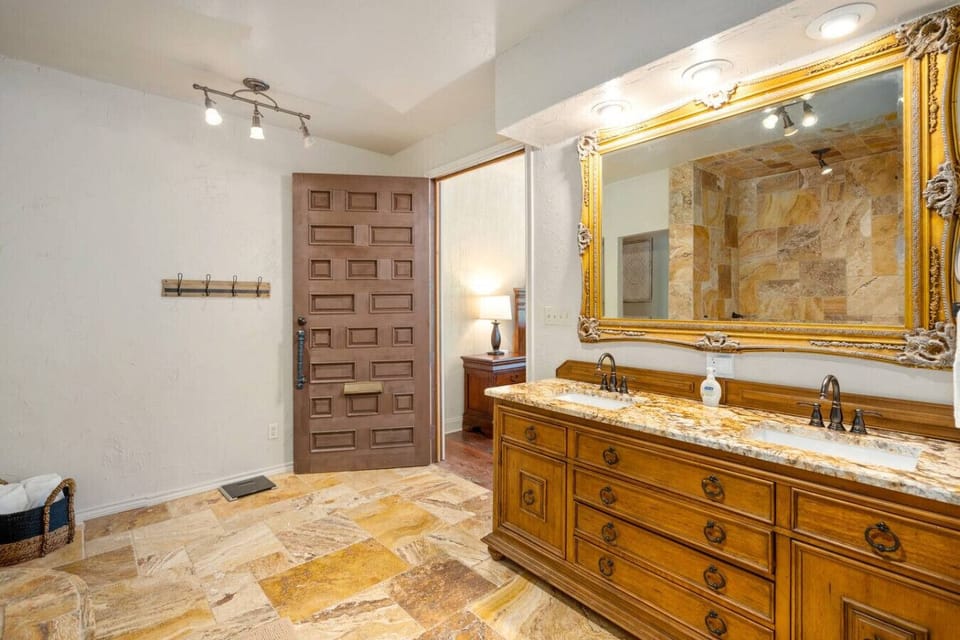 Bathroom 1 (Capri) - double vanity, toilet, Roman bath, rain shower