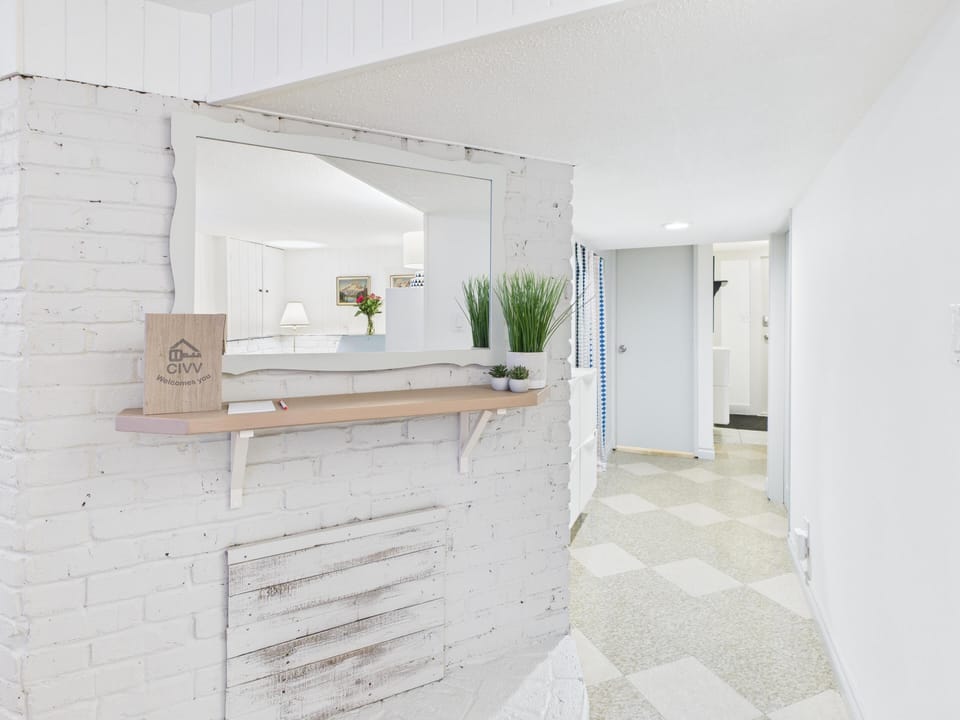 A closer look at the decorative fireplace mantle framing the home's unique character.
