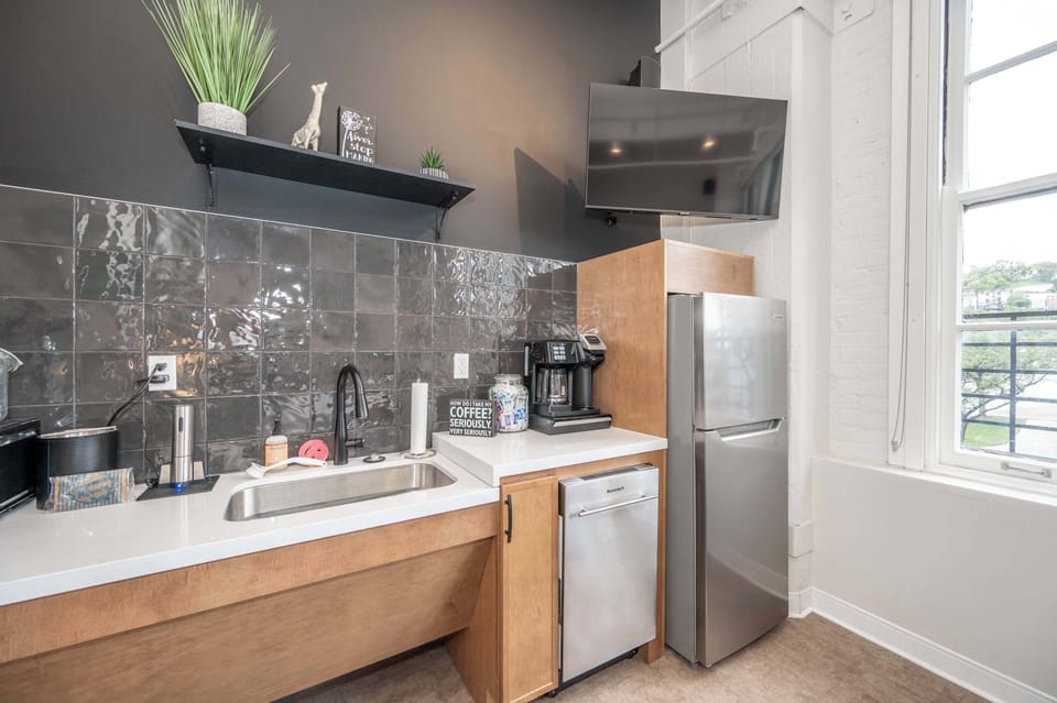 Suite 204’s open kitchenette is well equipped for an unforgettable getaway​​