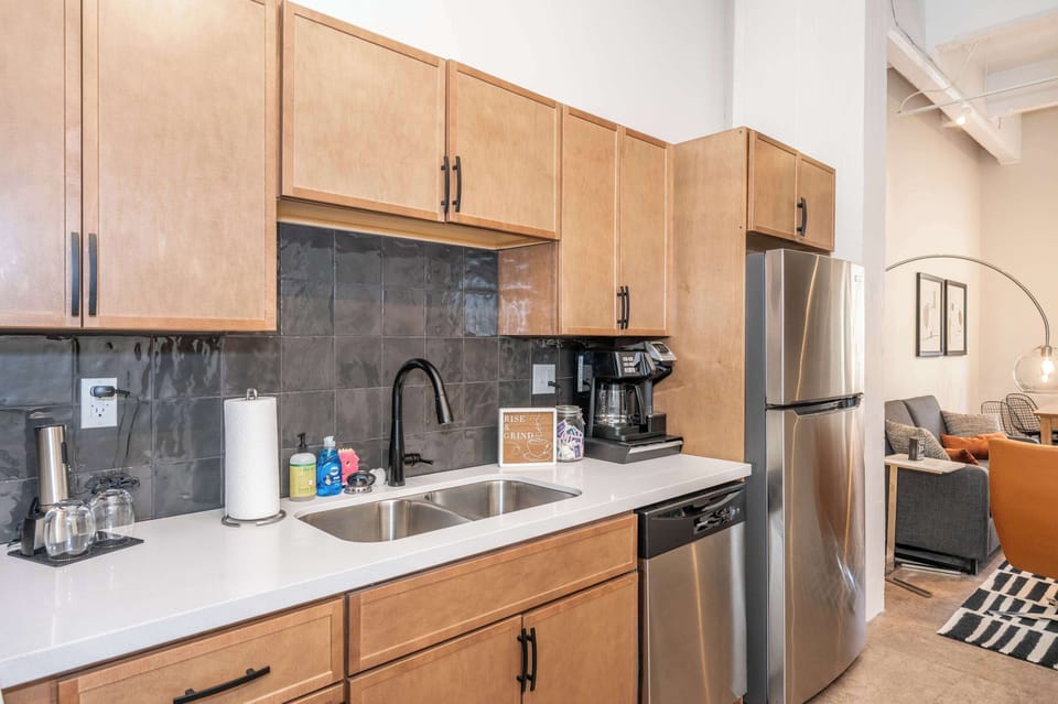 The chic, open kitchen in Suite 202 is well equipped for an unforgettable getaway​​