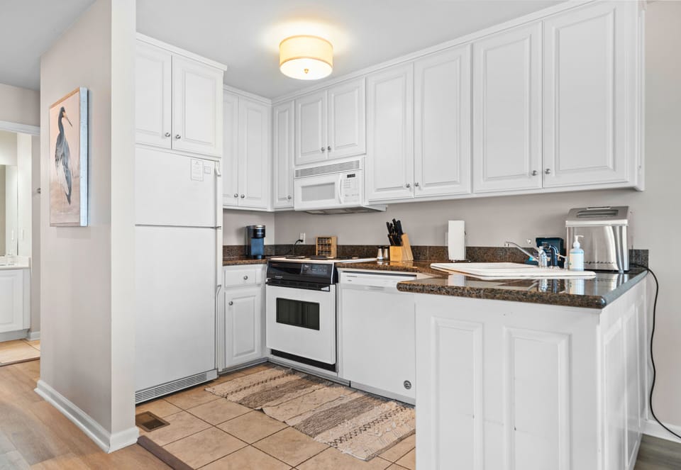 Bright, functional kitchen with everything you need to cook at home.