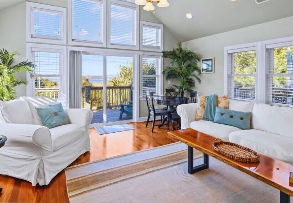 Wall-to-wall sound views from the main living area — your front-row seat to coastal sunsets.