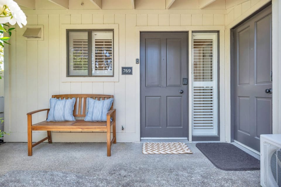 Cozy touches, charming details, and a bench made for slow mornings and golden hour chats.