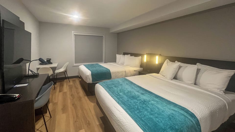Standard Room, 2 Queen Beds, Non Smoking, Kitchen | Free WiFi, bed sheets