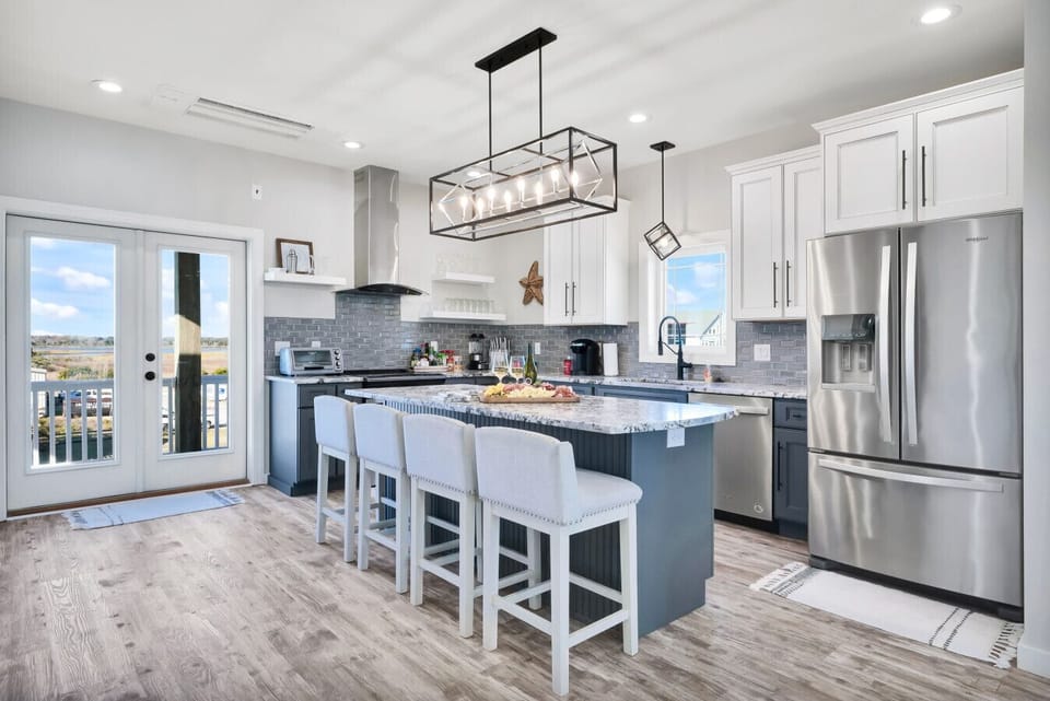 Kitchen | Modern Design with Marble Counters & Stainless Appliances