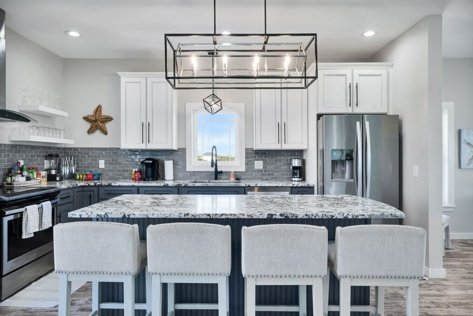 Kitchen | Modern Design with Marble Counters & Stainless Appliances