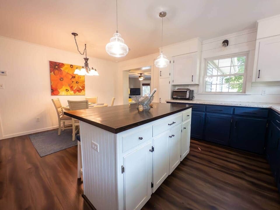 The kitchen is quite spacious with plenty of room to gather around the island to enjoy some snacks. 