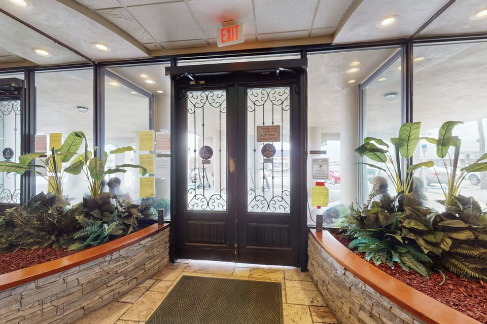 Welcoming, secure building entrance with controlled access and coastal style. Enjoy peace of mind and easy arrivals throughout your beach stay, just moments from sun, sand, and seaside attractions.