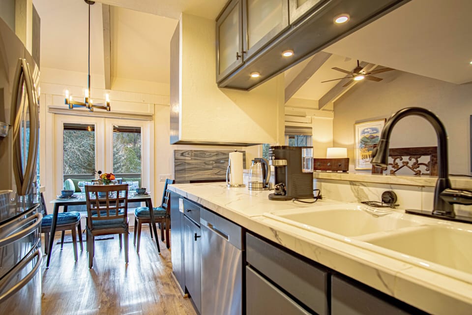 Dining and kitchen views of Baldy Mountain.
