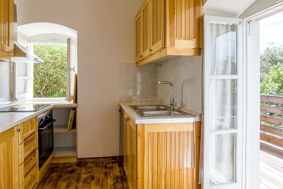 Kitchen area with access to terrace