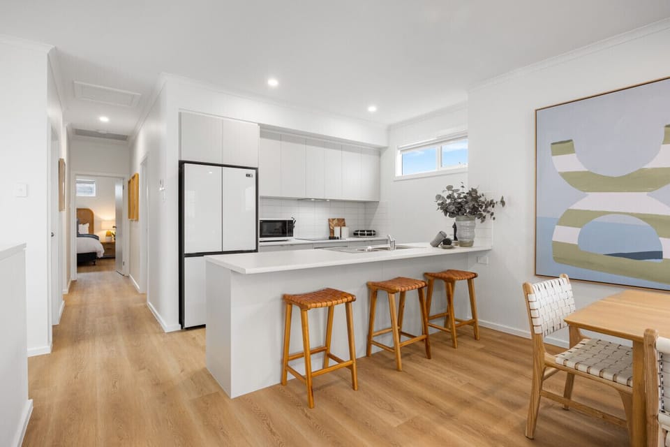 The kitchen is a home cook’s dream, fully stocked and ready for everything from casual breakfasts to shared dinners.