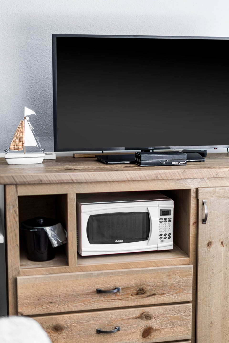 Convenient setup with a microwave and TV