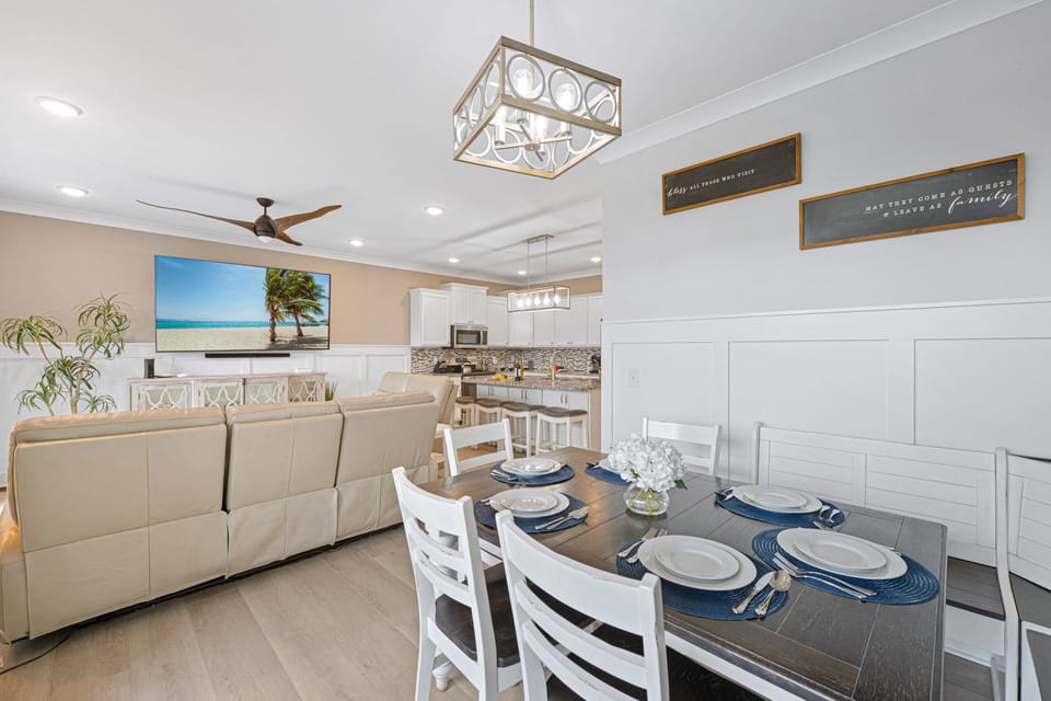 Farmhouse dining table with seating for 8, plus 4 additional seats at the kitchen island!