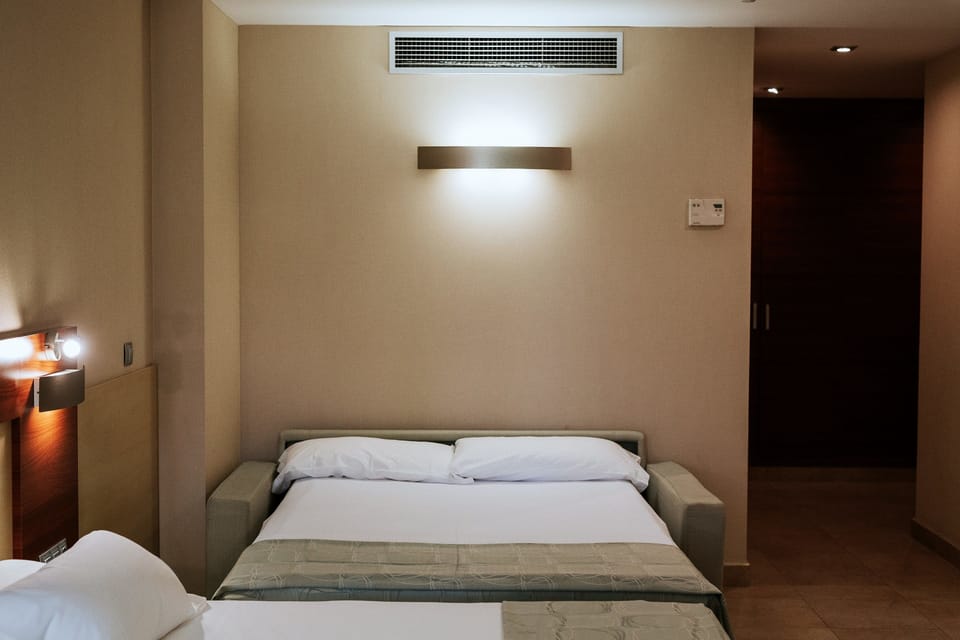 Triple Room (3 Adults) | Minibar, in-room safe, desk, laptop workspace