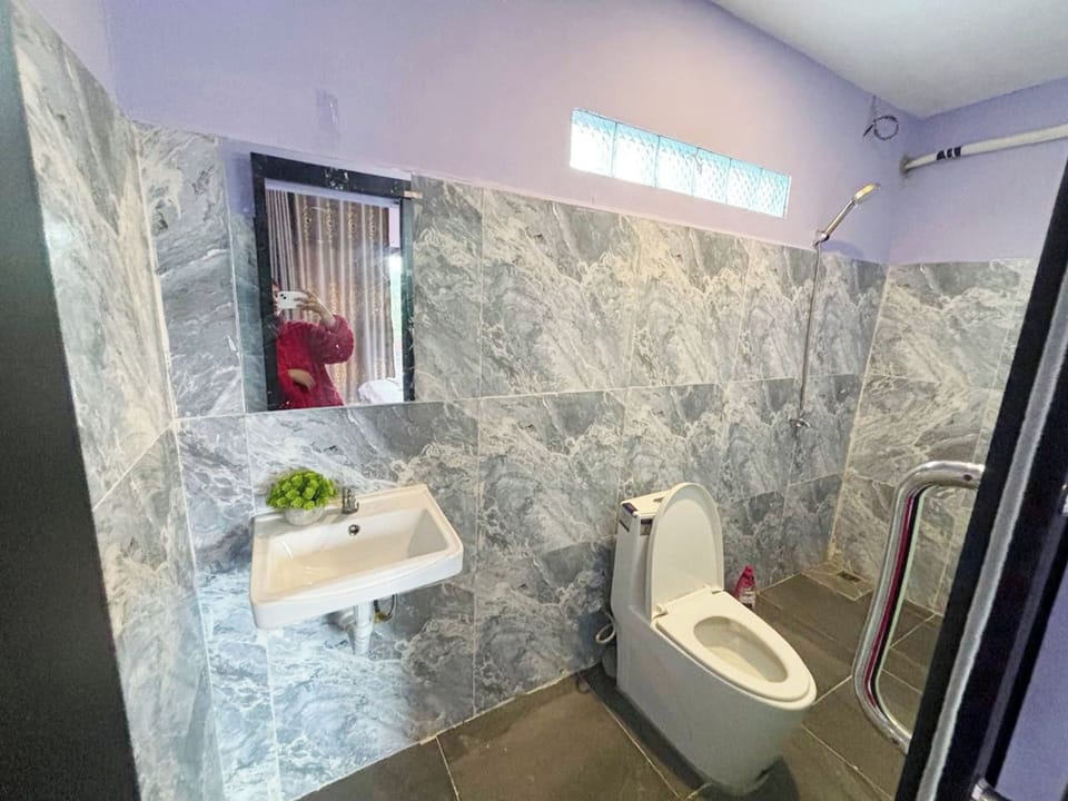 Shower, towels, toilet paper
