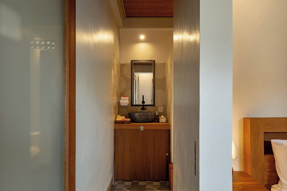 Shower, bathrobes, slippers, towels