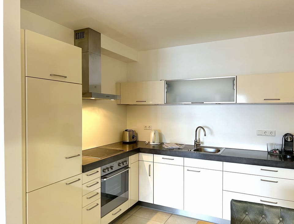 Kitchen, Countertop, Kitchen Appliance, Cabinetry, Flooring, Major Appliance, Interior Design, Furniture, Kitchen Sink, Home