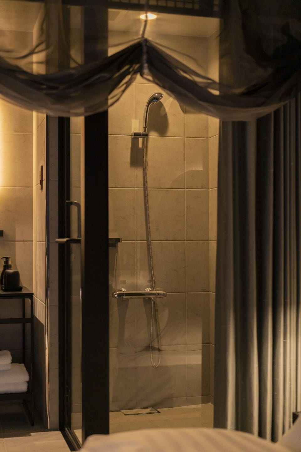 Shower, free toiletries, hair dryer, slippers