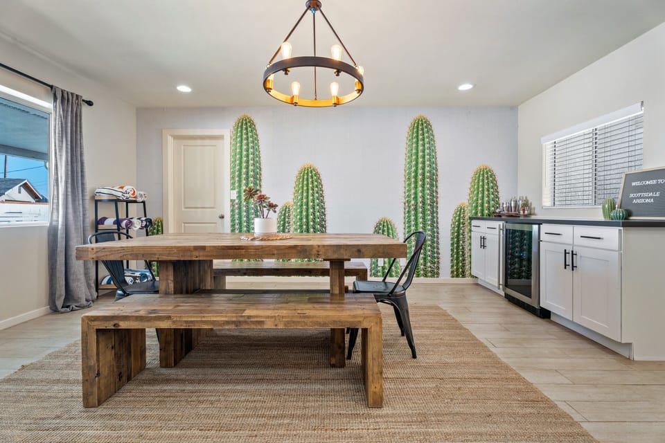 Dining area with a large wooden table.