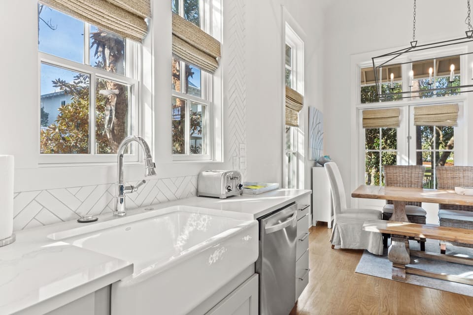 The kitchen features a farmhouse sink.