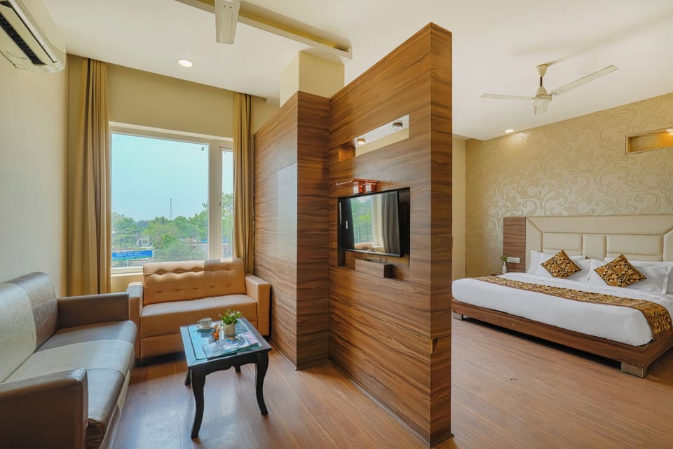 Luxury Room, City View | Living area | 32-inch Smart TV with cable channels