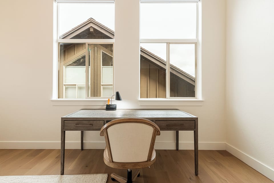 Peaceful workspace with a large window and natural light.