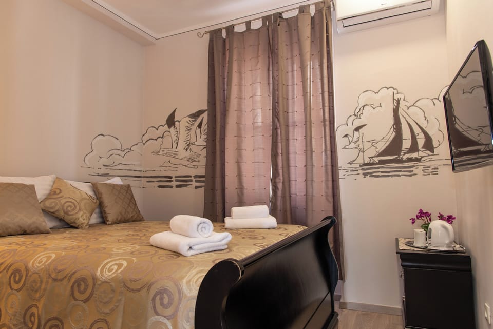 Classic Double Room, Courtyard View | In-room safe, iron/ironing board, free WiFi