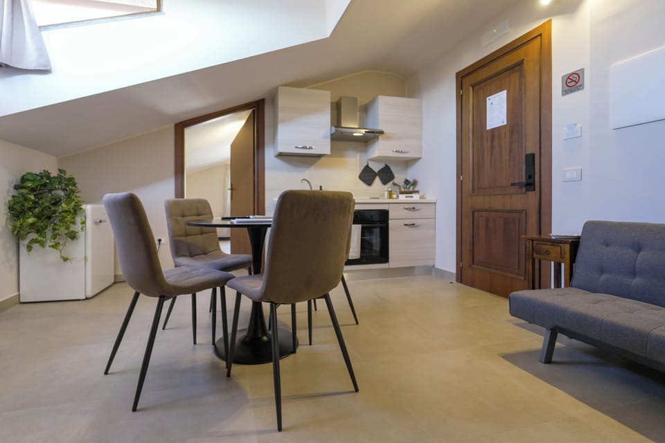 Deluxe Apartment | Living area | TV