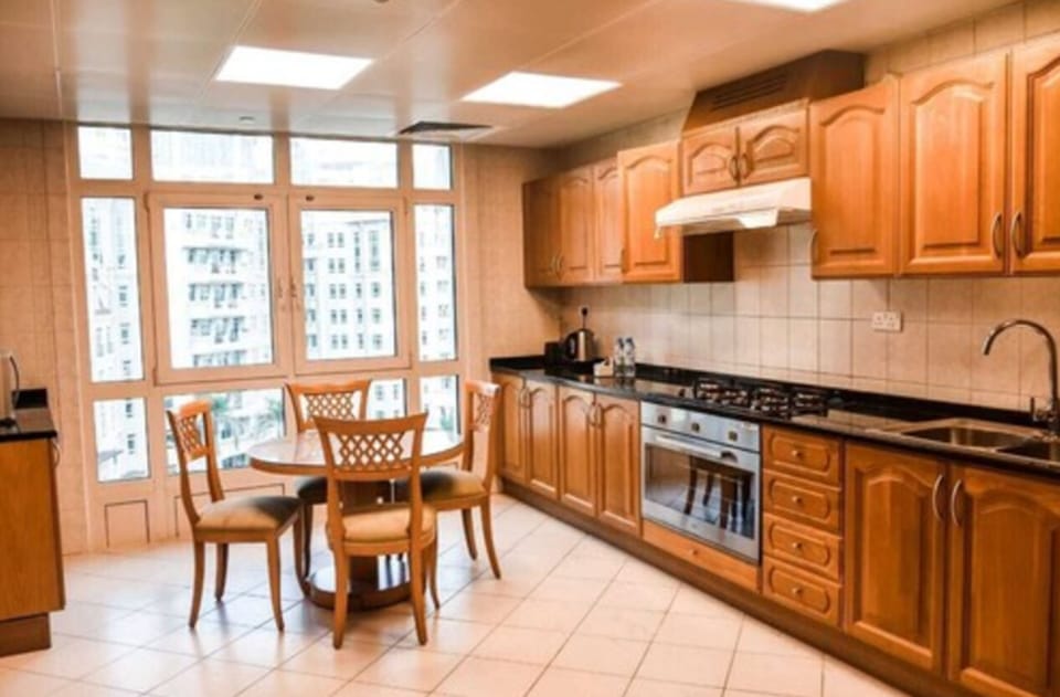 Apartment, 3 Bedrooms | Private kitchen | Coffee/tea maker, eco-friendly cleaning products