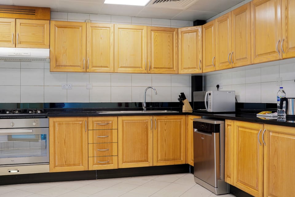 Penthouse, Multiple Beds | Private kitchen | Coffee/tea maker, eco-friendly cleaning products