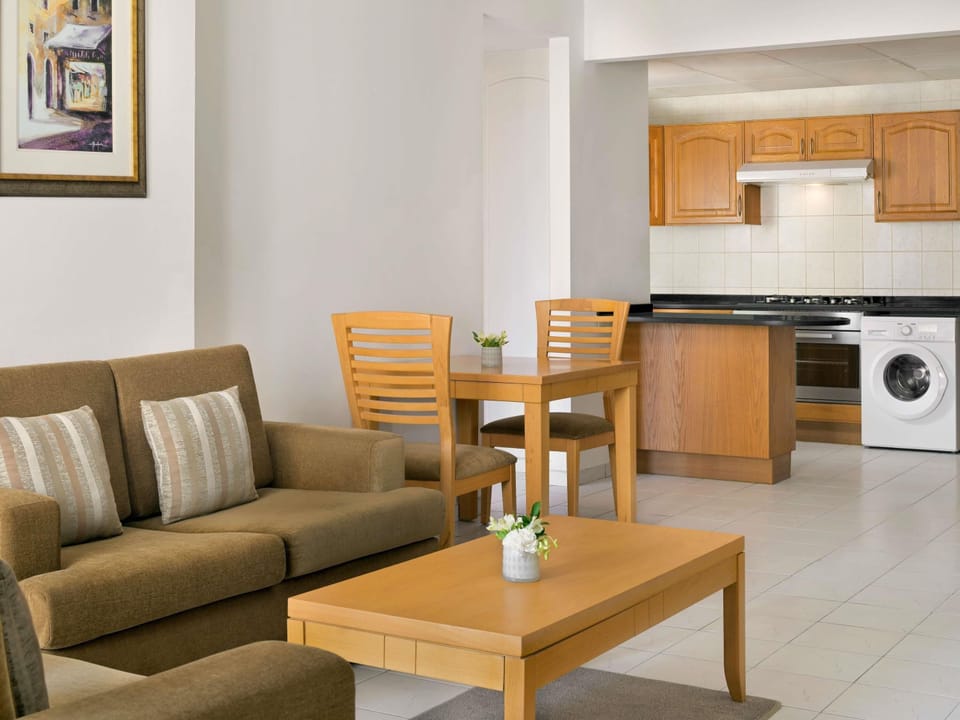 Apartment, 1 Bedroom | Minibar, in-room safe, individually furnished, desk