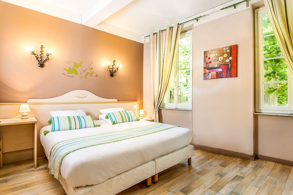 Superior Double or Twin Room | Minibar, in-room safe, desk, laptop workspace
