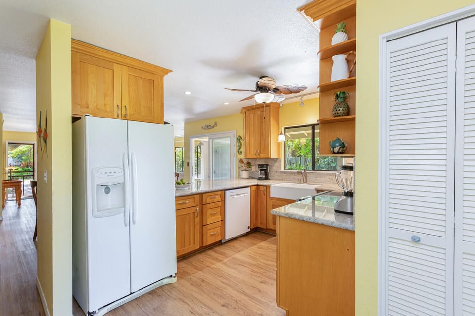 Kitchen is fully equipped with pots, pans and appliances
