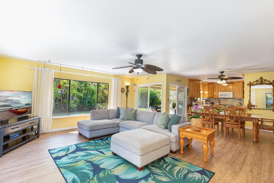 Spacious living area has flat screen TV for entertainment