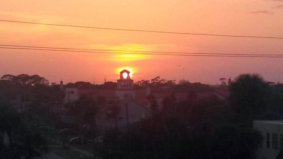 pretty sunset from the balcony over the local church