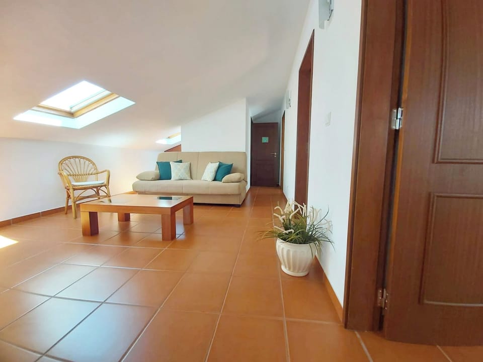 Family Studio | Living area | 32-inch LCD TV with satellite channels