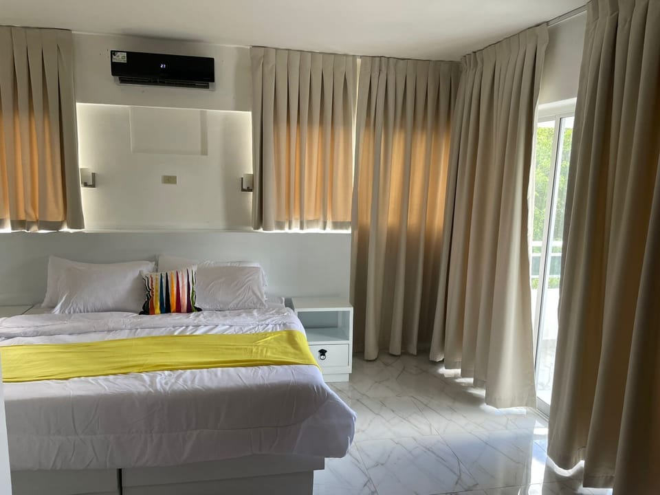 Superior Suite, 1 King Bed, City View | In-room safe, individually furnished, blackout drapes, soundproofing