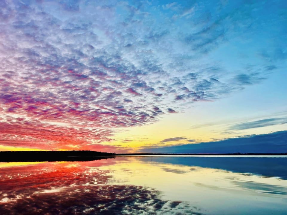 While this was taken on our pontoon its not uncommon to have beautiful sunsets and sunrises every day. 