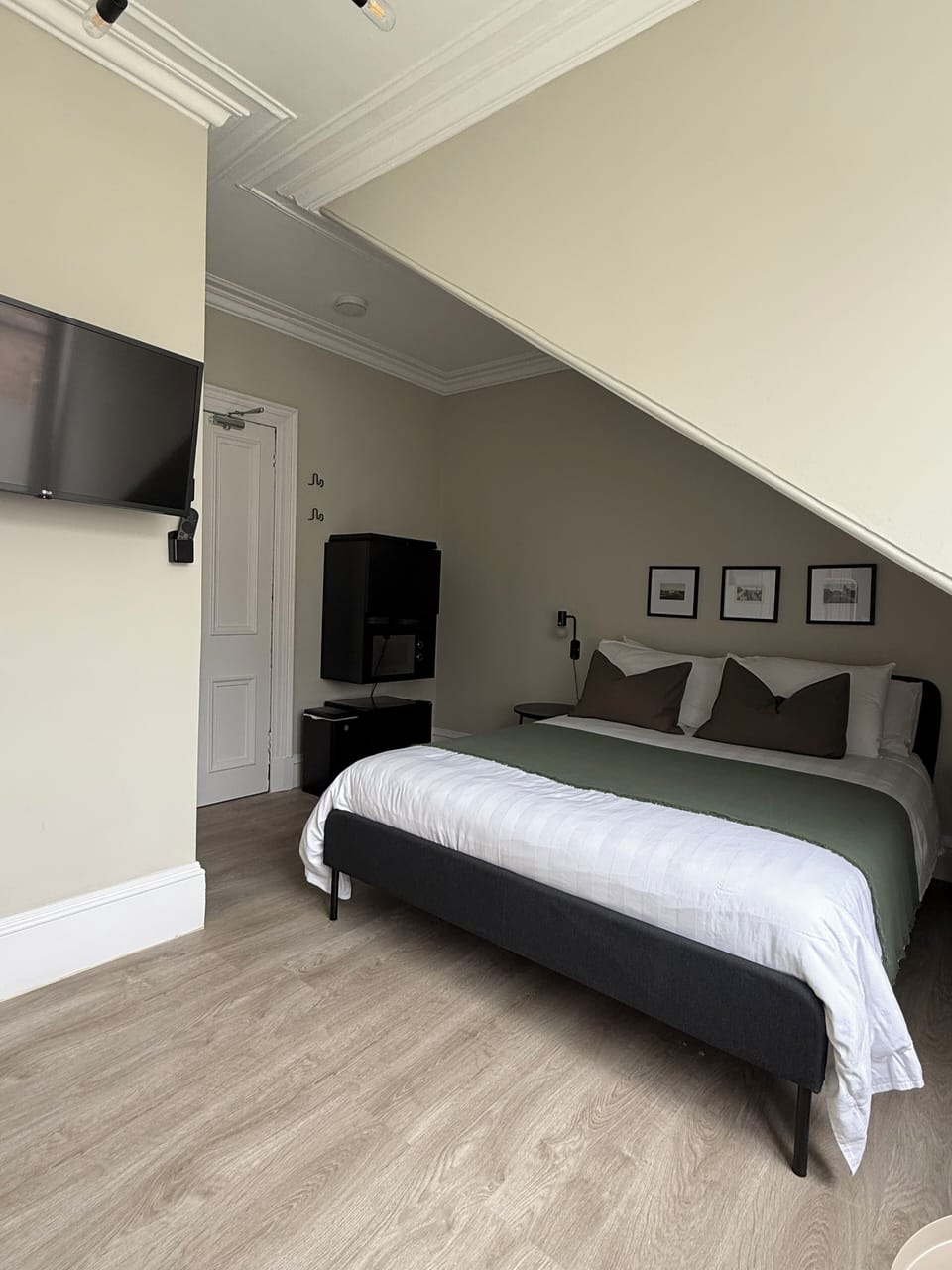 Double Room, City View | Blackout drapes, iron/ironing board, free WiFi