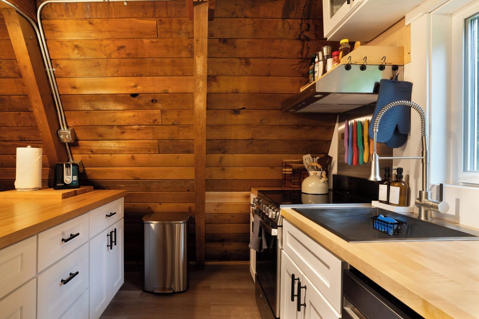 The wood walls add so much warmth, giving you that true cabin vibe.