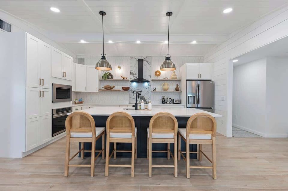 Fully equipped kitchen features a  water pot filler behind stove, Quartz countertops and  top of the line appliances! We stock olive and coconut oil as well as some spices and salt and pepper for our guests to enjoy! 
