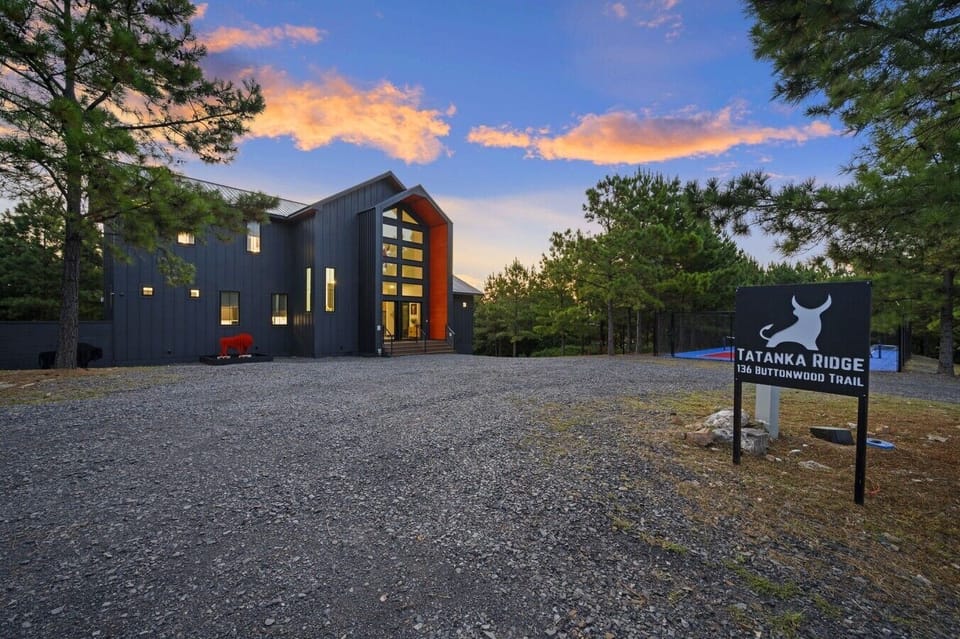 Stunning evening view of the home and surrounding landscape