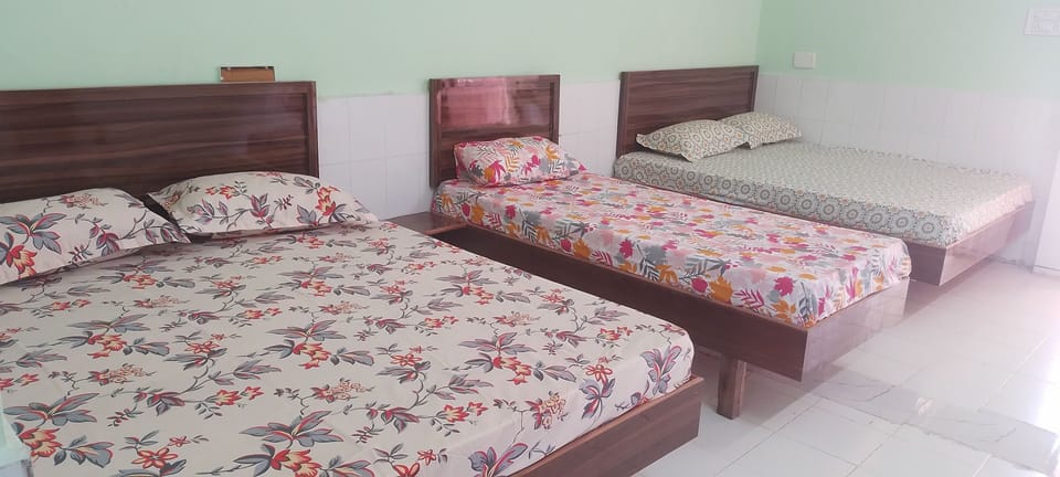 Comfort Quadruple Room, City View | Free WiFi, bed sheets
