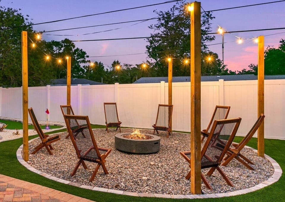 Unwind under the stars with comfortable seating around the fire pit.