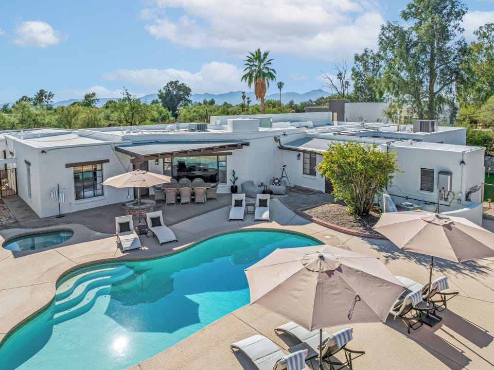 Welcome to this dreamhouse property with a gorgeous pool and hot tub!